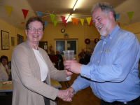 11.01.2011 - Rod Lord - OGAFCA social evening (Nov 26 2010) - Gren Annetts congratulates Paula Grevett, who donated her winnings